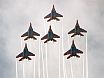 The ''Strizhi'' aerobatic team flying MiG-29s